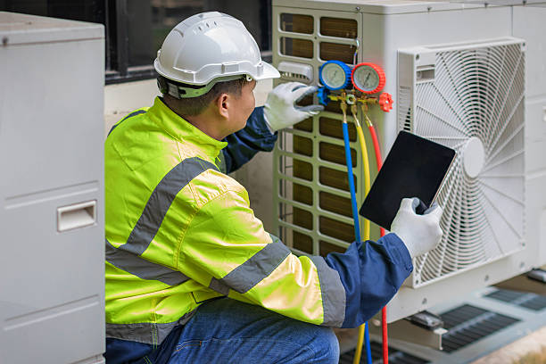 Professional Air Conditioning Repair technician working in Hasbrouck Heights, NJ